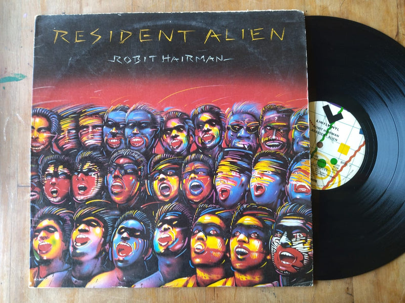 Robit Hairman – Resident Alien (USA VG)