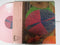 AU | Verbs (USA EX) Pink Vinyl
